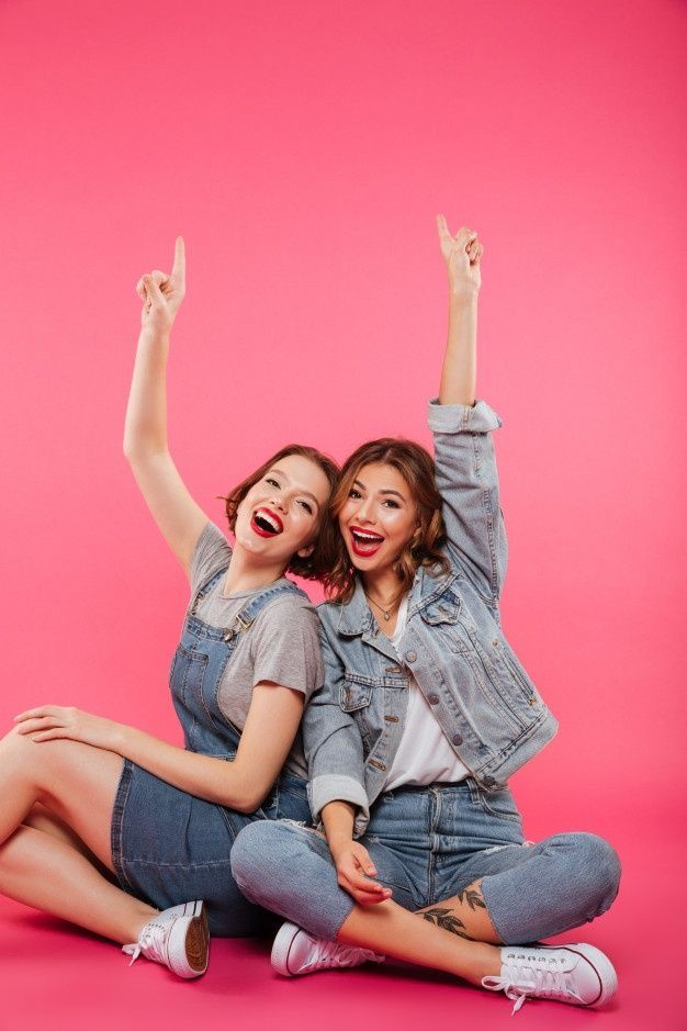 Two colleagues celebrating a result